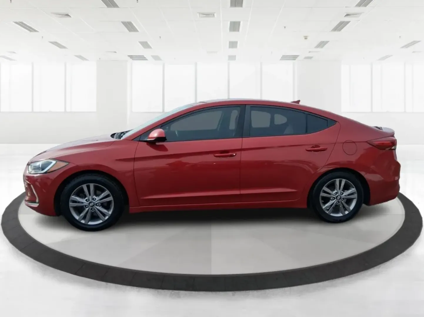 2017 Hyundai Elantra SE (KMHD84LF5HU) with an Nu 2L I-4 DOHC engine, 6A transmission, located at 1099 N County Rd 25A, Troy, OH, 45373, (937) 908-9800, 40.057079, -84.212883 - Planning a reliable daily commute from Troy to Dayton, a fuel-friendly run to the Miami Valley Centre Mall, or an easy weekend escape up I75? This 2017 Hyundai Elantra SE in eye-catching Scarlet Red Pearl is the kind of practical sedan that fits real life-comfortable for long drives, small enough fo - Photo#4