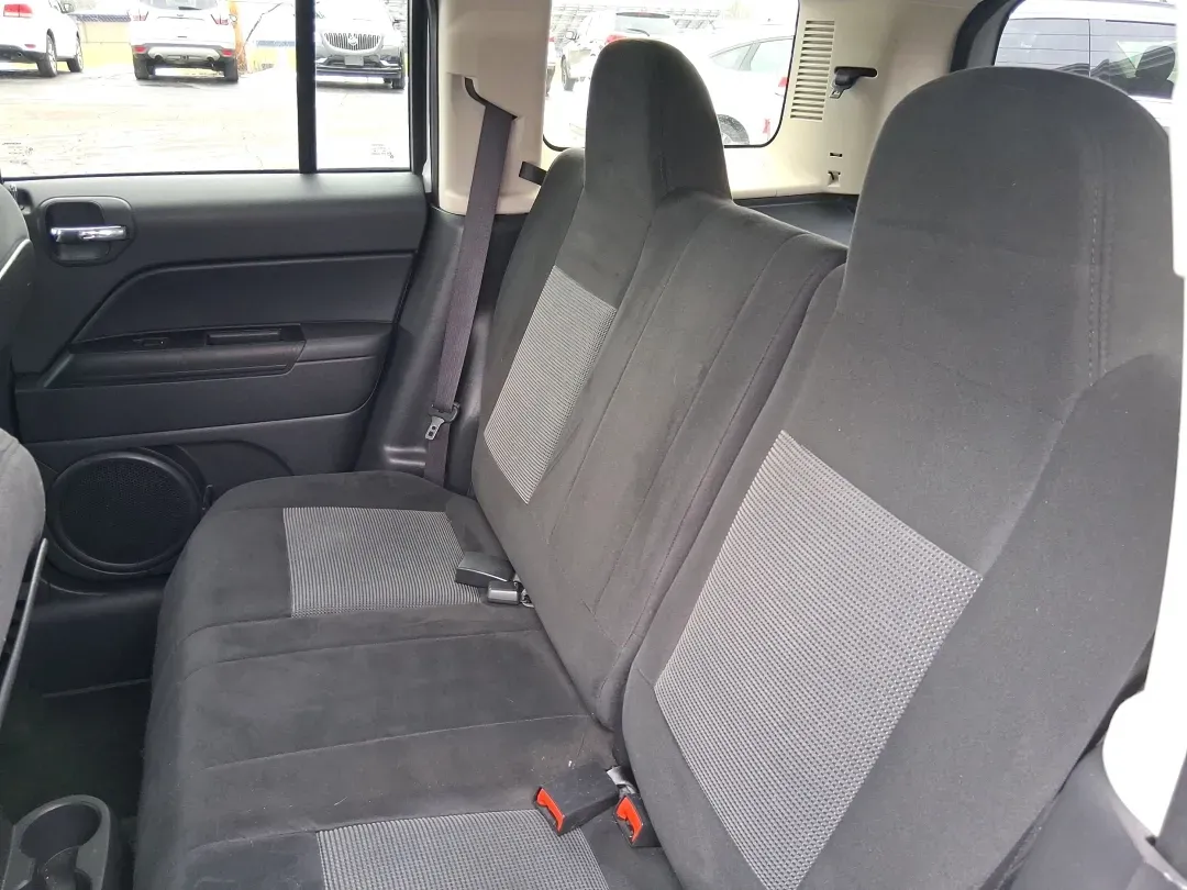 2016 Jeep Patriot Latitude (1C4NJPFA8GD) with an 2.0L L4 DOHC 16V engine, located at 1951 S Dayton Lakeview Rd., New Carlisle, OH, 45344, (937) 908-9800, 39.890999, -84.050255 - Picture your next weekend escape: loading up the gear, pointing the hood toward John Bryan State Park or a day trip to Dayton, and enjoying the confident, go-anywhere feel that makes a Jeep a Jeep. This **2016 Jeep Patriot Latitude** is a smart fit for commuters, first-time buyers, and budget-consci - Photo#10