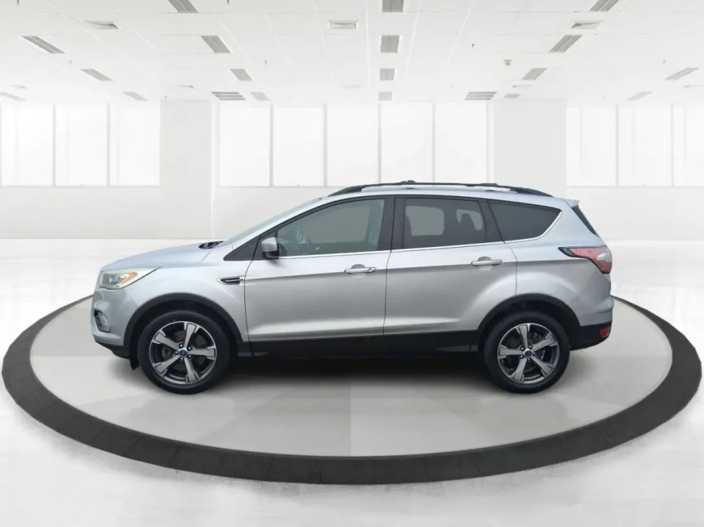 2017 Ford Escape SE (1FMCU0GD5HU) with an 1.5L L4 DOHC 16V engine, 6A transmission, located at 1099 N County Rd 25A, Troy, OH, 45373, (937) 908-9800, 40.057079, -84.212883 - Picture your next Ohio weekend: a quick run up I75 for errands, a family day at Treasure Island Park, or a spontaneous road trip to Dayton-without worrying about space, comfort, or winter-ready confidence. This 2017 Ford Escape SE SUV is built for real life in Troy, offering the easy maneuverability - Photo#5