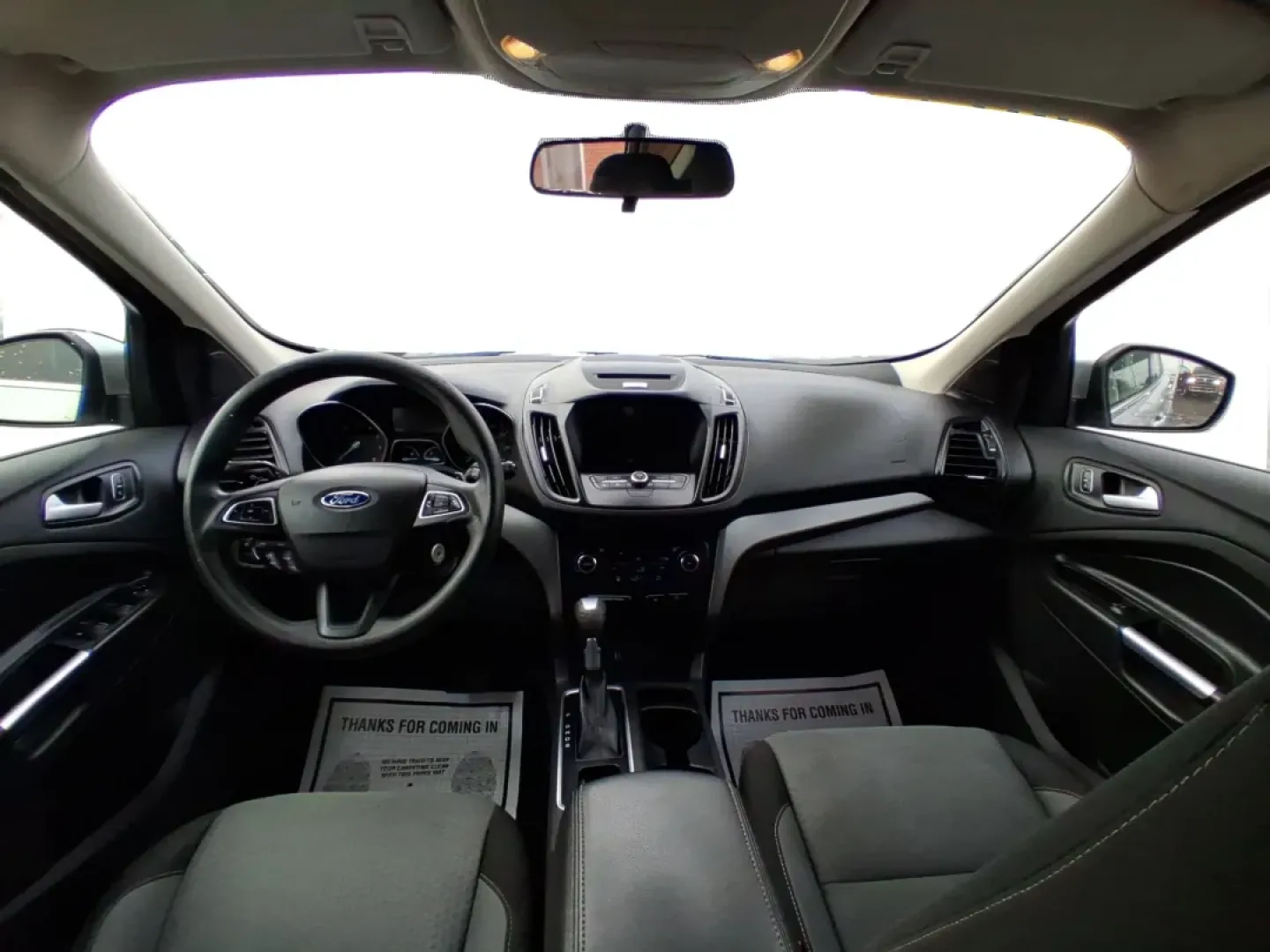 2017 Ford Escape SE (1FMCU0GD5HU) with an 1.5L L4 DOHC 16V engine, 6A transmission, located at 1099 N County Rd 25A, Troy, OH, 45373, (937) 908-9800, 40.057079, -84.212883 - Picture your next Ohio weekend: a quick run up I75 for errands, a family day at Treasure Island Park, or a spontaneous road trip to Dayton-without worrying about space, comfort, or winter-ready confidence. This 2017 Ford Escape SE SUV is built for real life in Troy, offering the easy maneuverability - Photo#21