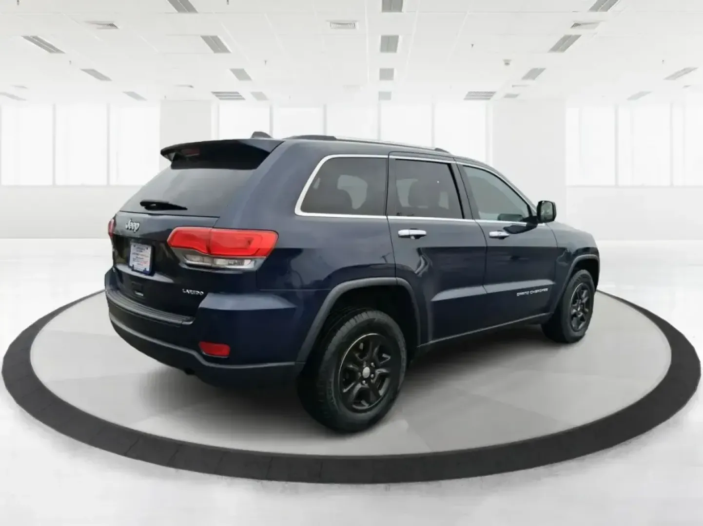 2015 Jeep Grand Cherokee Laredo (1C4RJFAG1FC) with an 3.6L V-6 DOHC engine, 8-Speed Automatic transmission, located at 1951 S Dayton Lakeview Rd., New Carlisle, OH, 45344, (937) 908-9800, 39.890999, -84.050255 - Picture a weekend that starts with a smooth commute through Clark County and ends with a spontaneous road trip-camp gear in the back, friends in the second row, and confidence when the weather turns. This 2015 Jeep Grand Cherokee Laredo is built for real life in Ohio: school runs, long drives down I - Photo#2