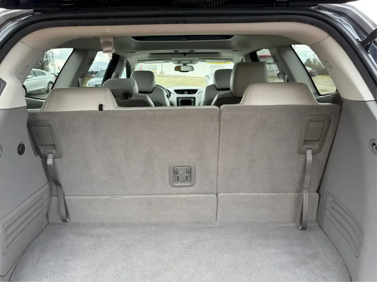 2016 Chevrolet Traverse 2LT (1GNKVHKD0GJ) with an 3.6L V-6 gasoline direct injection engine, 6-Speed Automatic transmission, located at 401 Woodman Dr, Riverside, OH, 45431, (937) 908-9800, 39.760899, -84.123421 - Pack up the kids, cue up the playlist, and point the GPS toward your next weekend getaway-this 2016 Chevrolet Traverse 2LT is the kind of roomy, confident SUV that makes school runs, long commutes, and road trips out of Riverside feel easy and comfortable. With seating flexibility, family-friendly s - Photo#12