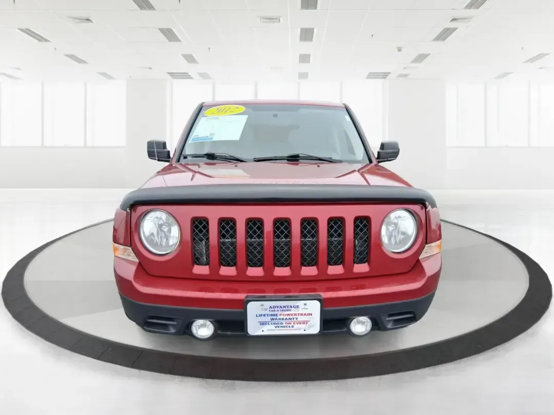 2012 Jeep Patriot Latitude (1C4NJPFB0CD) with an 2.4L L4 DOHC 16V engine, located at 1099 N County Rd 25A, Troy, OH, 45373, (937) 908-9800, 40.057079, -84.212883 - Picture your next weekend: a quick run up I-75 for a family visit, a scenic drive past the Miami River, then an easy loop back through downtown Troy for dinner-without worrying about whether your SUV can keep up with daily life. This 2012 Jeep Patriot Latitude is built for practical adventures and e - Photo#7