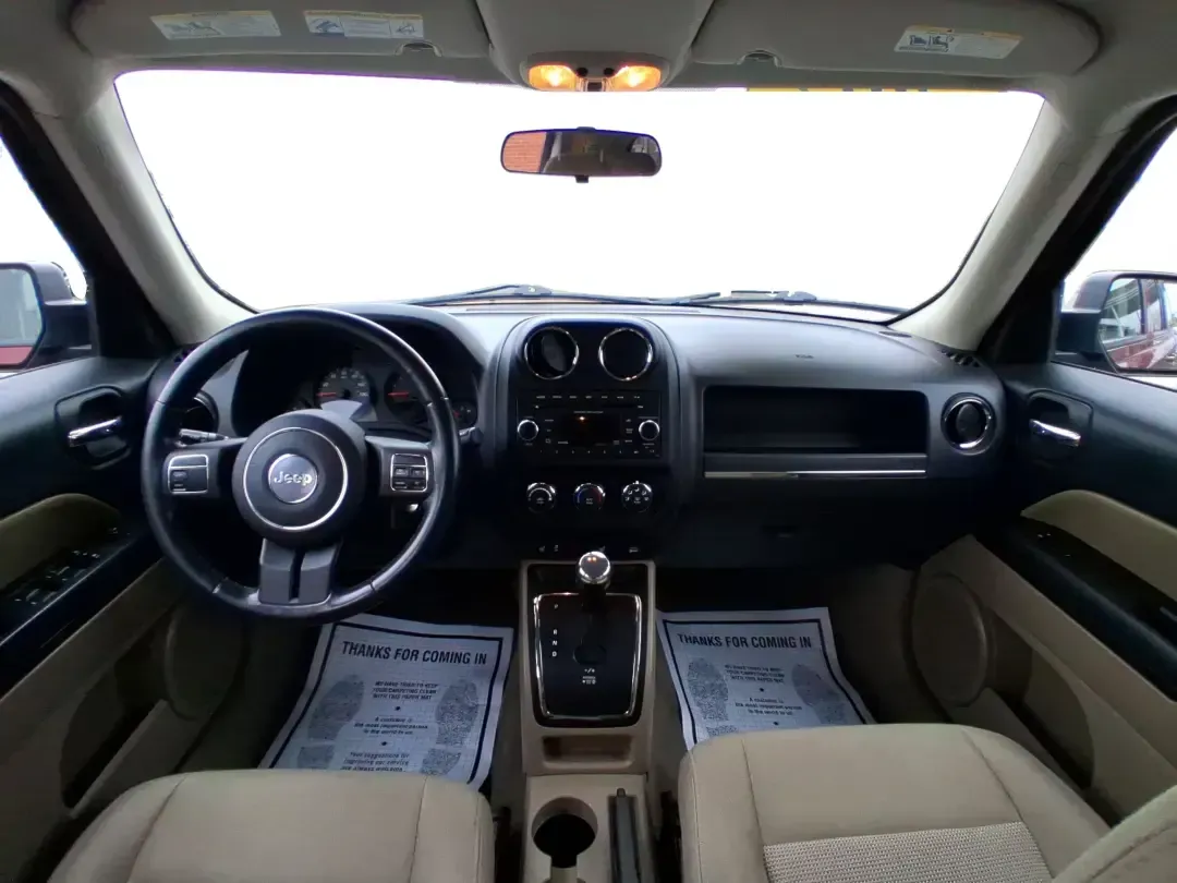 2012 Jeep Patriot Latitude (1C4NJPFB0CD) with an 2.4L L4 DOHC 16V engine, located at 1099 N County Rd 25A, Troy, OH, 45373, (937) 908-9800, 40.057079, -84.212883 - Picture your next weekend: a quick run up I-75 for a family visit, a scenic drive past the Miami River, then an easy loop back through downtown Troy for dinner-without worrying about whether your SUV can keep up with daily life. This 2012 Jeep Patriot Latitude is built for practical adventures and e - Photo#19