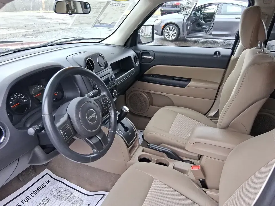 2012 Jeep Patriot Latitude (1C4NJPFB0CD) with an 2.4L L4 DOHC 16V engine, located at 1099 N County Rd 25A, Troy, OH, 45373, (937) 908-9800, 40.057079, -84.212883 - Picture your next weekend: a quick run up I-75 for a family visit, a scenic drive past the Miami River, then an easy loop back through downtown Troy for dinner-without worrying about whether your SUV can keep up with daily life. This 2012 Jeep Patriot Latitude is built for practical adventures and e - Photo#9