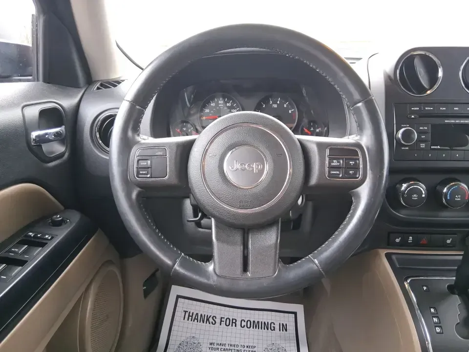 2012 Jeep Patriot Latitude (1C4NJPFB0CD) with an 2.4L L4 DOHC 16V engine, located at 1099 N County Rd 25A, Troy, OH, 45373, (937) 908-9800, 40.057079, -84.212883 - Picture your next weekend: a quick run up I-75 for a family visit, a scenic drive past the Miami River, then an easy loop back through downtown Troy for dinner-without worrying about whether your SUV can keep up with daily life. This 2012 Jeep Patriot Latitude is built for practical adventures and e - Photo#16