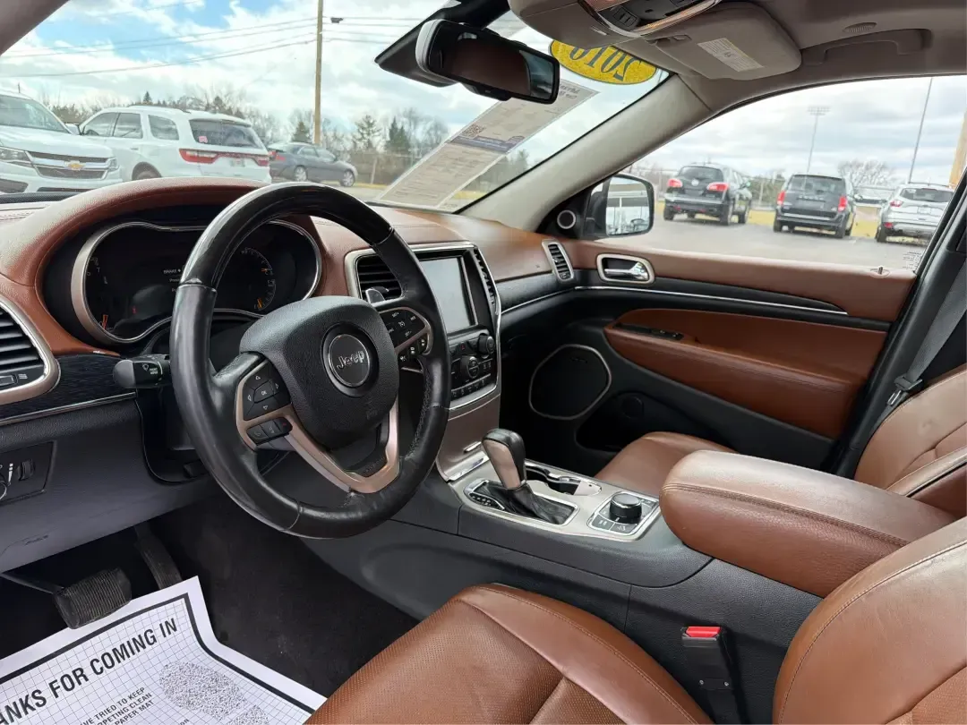 2016 Jeep Grand Cherokee Summit (1C4RJFJGXGC) with an 3.6L V6 DOHC 24V engine, 8A transmission, located at 1184 Kauffman Ave, Fairborn, OH, 45324, (937) 908-9800, 39.807072, -84.030914 - Pack the cooler, load up the family, and point the hood toward your next weekend escape-this 2016 Jeep Grand Cherokee Summit 4WD is built for Ohio life, from daily commutes across town to road trips out toward Hocking Hills. With its confident SUV stance, upscale Summit trim, and go-anywhere capabil - Photo#9