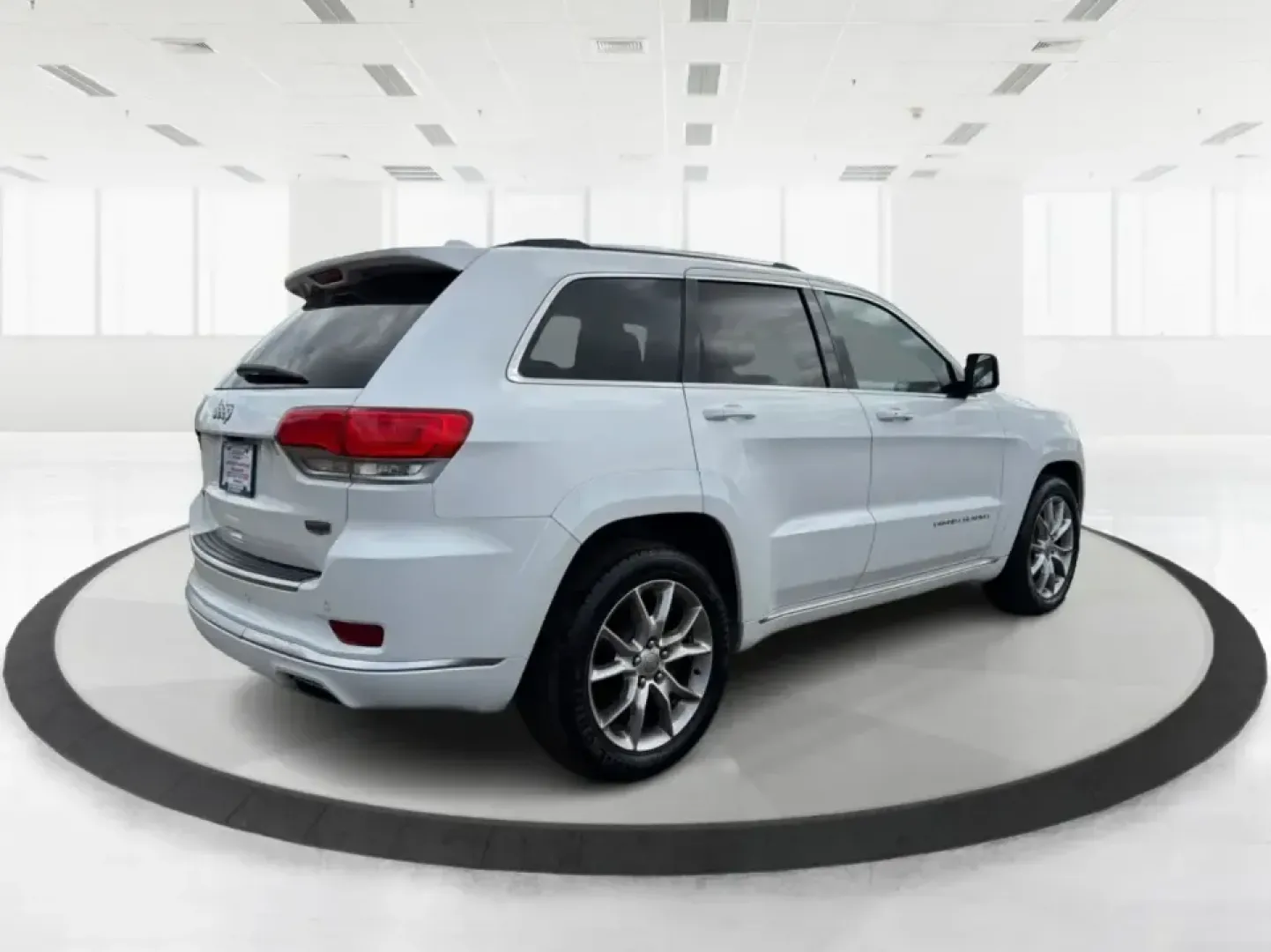 2016 Jeep Grand Cherokee Summit (1C4RJFJGXGC) with an 3.6L V6 DOHC 24V engine, 8A transmission, located at 1184 Kauffman Ave, Fairborn, OH, 45324, (937) 908-9800, 39.807072, -84.030914 - Pack the cooler, load up the family, and point the hood toward your next weekend escape-this 2016 Jeep Grand Cherokee Summit 4WD is built for Ohio life, from daily commutes across town to road trips out toward Hocking Hills. With its confident SUV stance, upscale Summit trim, and go-anywhere capabil - Photo#2