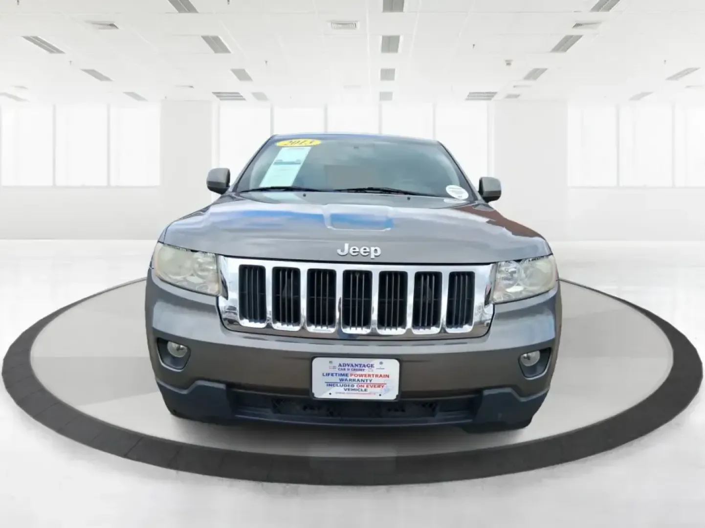2013 Jeep Grand Cherokee Laredo (1C4RJFAG1DC) with an 3.6L V6 DOHC 24V engine, 5-Speed Automatic transmission, located at 401 Woodman Dr, Riverside, OH, 45431, (937) 908-9800, 39.760899, -84.123421 - Pack up the family, point the hood toward the next weekend getaway, and enjoy the confidence that comes with a capable SUV built for real life in Ohio. This 2013 Jeep Grand Cherokee Laredo in Mineral Gray Metallic Clearcoat is the kind of vehicle that fits your routine Monday through Friday-then tur - Photo#7