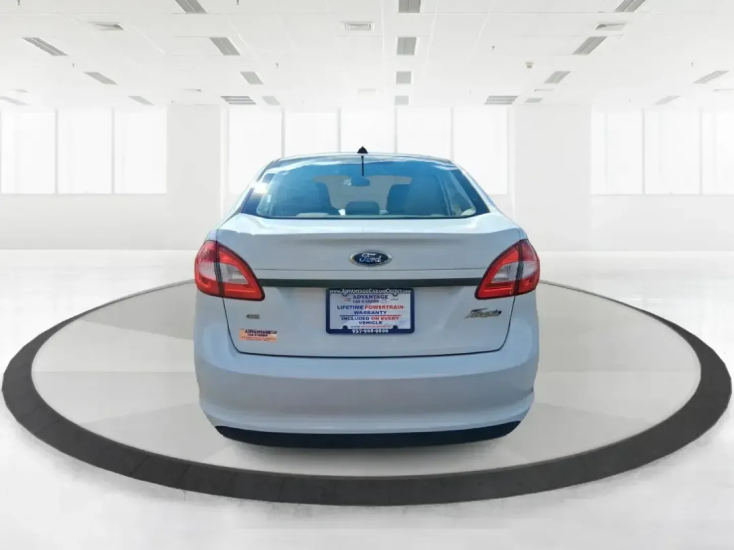 2013 Ford Fiesta SE (3FADP4BJXDM) with an 1.6L I-4 DOHC engine, located at 1951 S Dayton Lakeview Rd., New Carlisle, OH, 45344, (937) 908-9800, 39.890999, -84.050255 - Need a smart, efficient commuter that's easy to park downtown, nimble on I70, and still comfortable for weekend errands or a quick getaway to Springfield or Dayton? This 2013 Ford Fiesta SE Sedan in Oxford White delivers practical daily driving with the kind of budget-friendly ownership that fits re - Photo#3