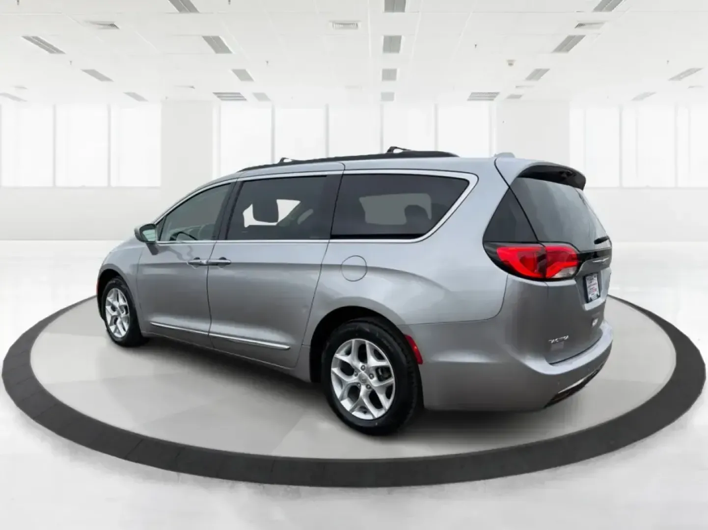 2017 Chrysler Pacifica Touring-L (2C4RC1BG1HR) with an Pentastar 3.6L V-6 DOHC engine, 6A transmission, located at 401 Woodman Dr, Riverside, OH, 45431, (937) 908-9800, 39.760899, -84.123421 - Life gets busy fast-school drop-offs, long commutes, weekend tournaments, and road trips that somehow require half the house. If you need one vehicle that can handle the everyday grind and still feel comfortable when you're headed out for a family getaway, this **2017 Chrysler Pacifica Touring-L** i - Photo#4