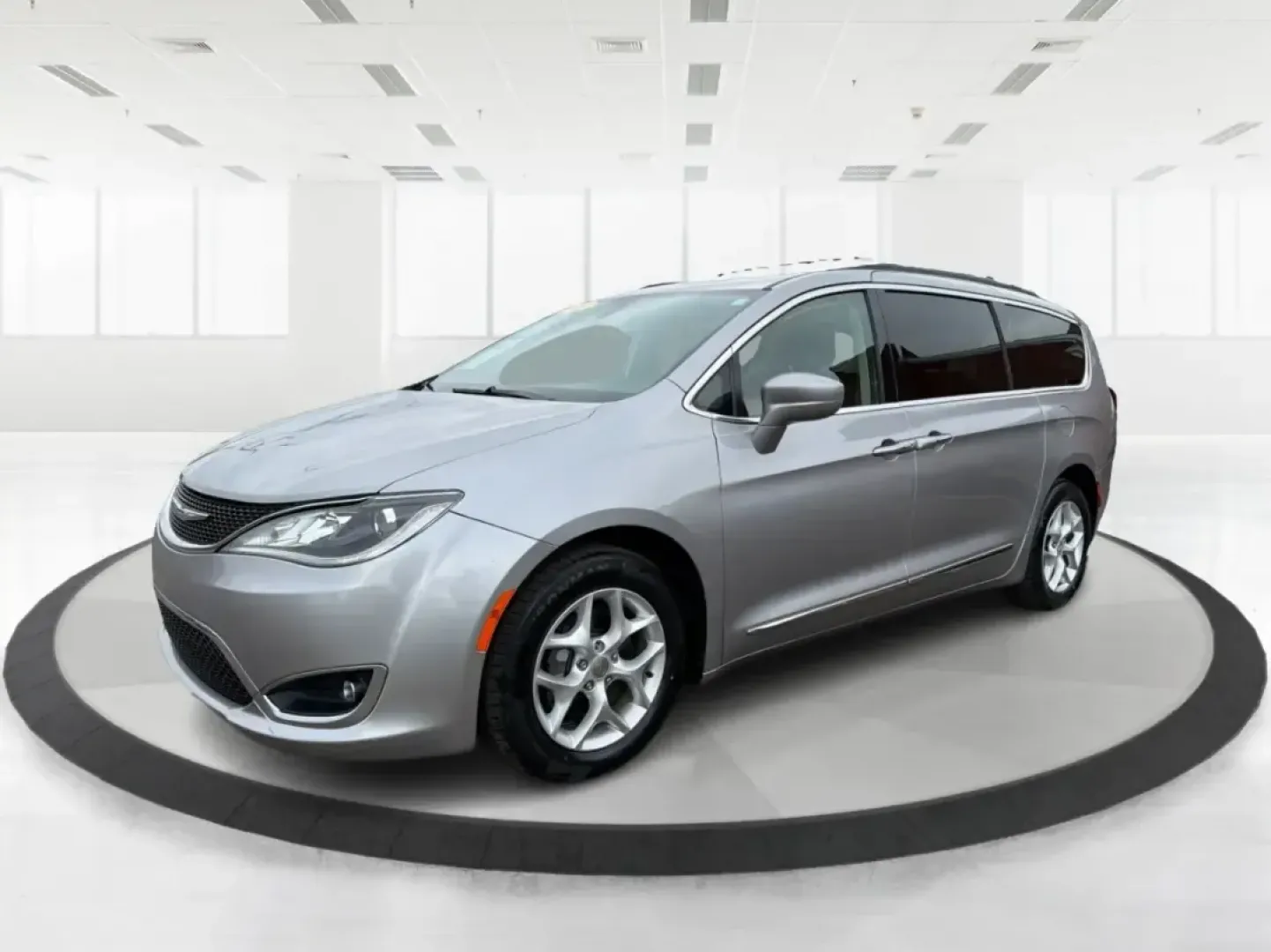 2017 Chrysler Pacifica Touring-L (2C4RC1BG1HR) with an Pentastar 3.6L V-6 DOHC engine, 6A transmission, located at 401 Woodman Dr, Riverside, OH, 45431, (937) 908-9800, 39.760899, -84.123421 - Life gets busy fast-school drop-offs, long commutes, weekend tournaments, and road trips that somehow require half the house. If you need one vehicle that can handle the everyday grind and still feel comfortable when you're headed out for a family getaway, this **2017 Chrysler Pacifica Touring-L** i - Photo#8