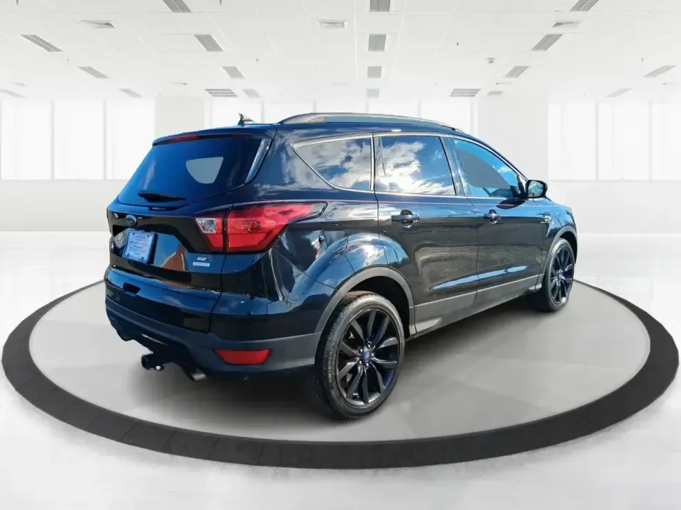 2019 Ford Escape SE (1FMCU0GD6KU) with an 1.5L L4 DOHC 16V engine, 6A transmission, located at 401 Woodman Dr, Riverside, OH, 45431, (937) 908-9800, 39.760899, -84.123421 - Need a dependable SUV for long commutes down I-675, quick school drop-offs, and weekend getaways to Carillon Historical Park or a day at the National Museum of the U.S. Air Force? This 2019 Ford Escape SE in Agate Black Metallic is built for real-life driving in and around Riverside, Ohio-comfortabl - Photo#2