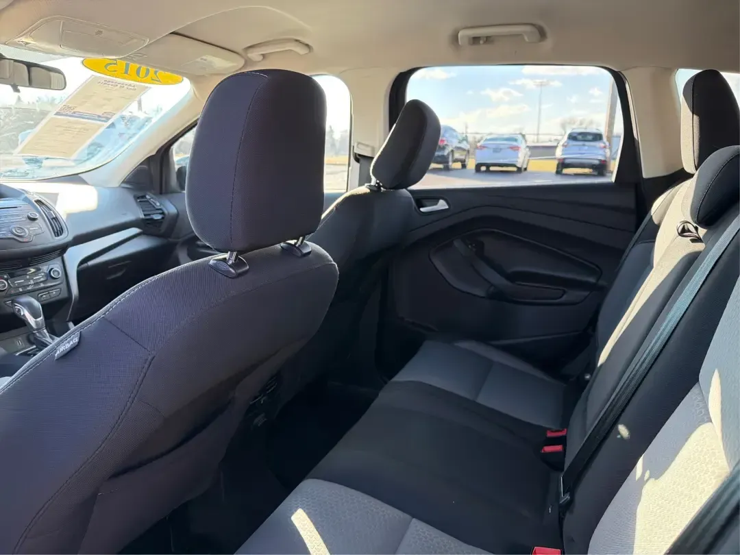 2018 Ford Escape SE (1FMCU9GD4JU) with an 1.5L L4 DOHC 16V engine, 6A transmission, located at 880 E. National Road, Vandalia, OH, 45377, (937) 908-9800, 39.891918, -84.183594 - Picture your next Ohio weekend: loading up the kids for a splash at Splash Xenia, cruising out to John Bryan State Park for a hike, or tackling a snowy morning commute from Beavercreek to downtown Dayton with confidence. This 2018 Ford Escape SE in Blue Metallic is the kind of compact SUV that fits - Photo#10