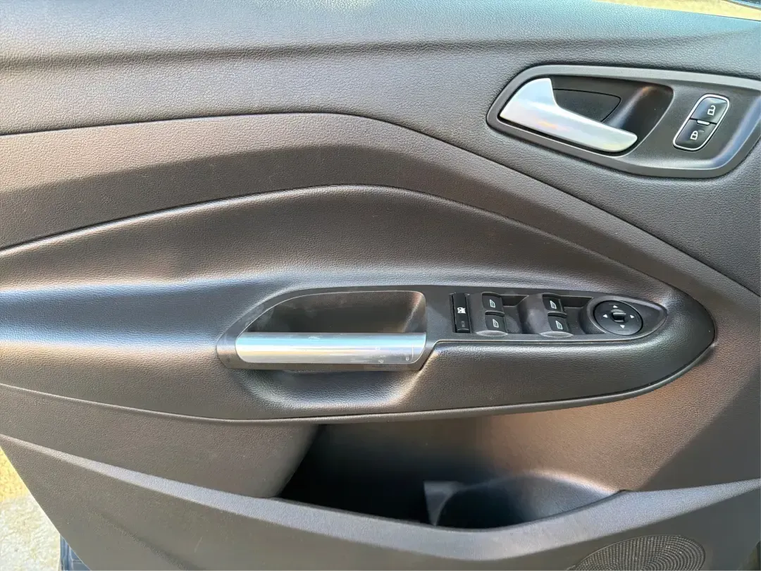 2018 Ford Escape SE (1FMCU9GD4JU) with an 1.5L L4 DOHC 16V engine, 6A transmission, located at 880 E. National Road, Vandalia, OH, 45377, (937) 908-9800, 39.891918, -84.183594 - Picture your next Ohio weekend: loading up the kids for a splash at Splash Xenia, cruising out to John Bryan State Park for a hike, or tackling a snowy morning commute from Beavercreek to downtown Dayton with confidence. This 2018 Ford Escape SE in Blue Metallic is the kind of compact SUV that fits - Photo#19