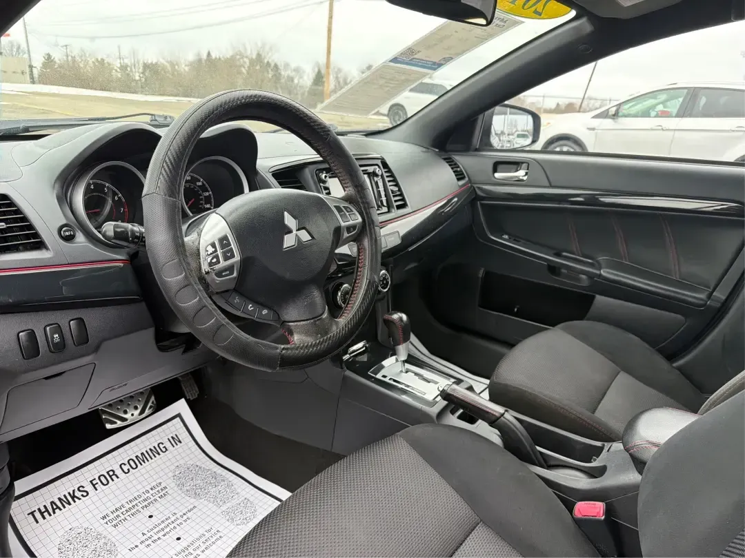 2017 Mitsubishi Lancer LE (JA32U2FU5HU) with an 2L I-4 DOHC engine, 5M transmission, located at 1230 East Main St, Xenia, OH, 45385, (937) 908-9800, 39.688026, -83.910172 - Picture your week running smoothly: a dependable commuter sedan for the drive to Dayton, an easy-to-park ride for errands around Xenia Station, and a comfortable car that's ready for a spontaneous weekend trip to Glen Helen Nature Preserve. This 2017 Mitsubishi Lancer LE is built for real-life routi - Photo#9