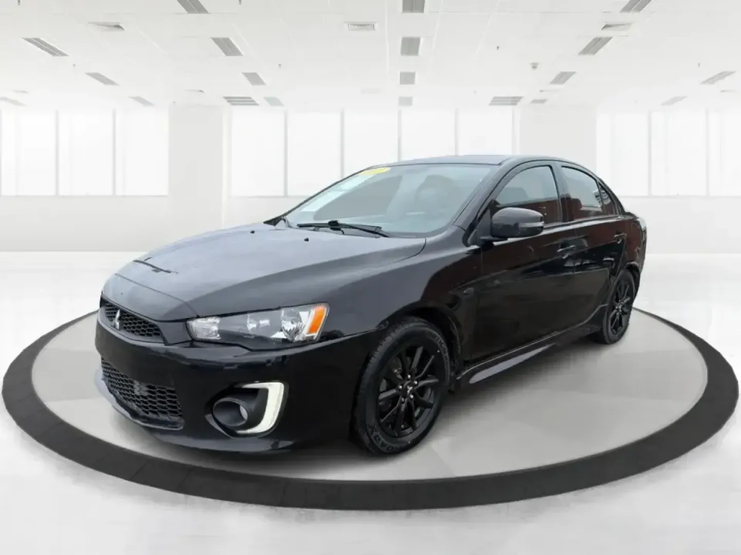 2017 Mitsubishi Lancer LE (JA32U2FU5HU) with an 2L I-4 DOHC engine, 5M transmission, located at 1184 Kauffman Ave, Fairborn, OH, 45324, (937) 908-9800, 39.807072, -84.030914 - Picture your week running smoothly: a dependable commuter sedan for the drive to Dayton, an easy-to-park ride for errands around Xenia Station, and a comfortable car that's ready for a spontaneous weekend trip to Glen Helen Nature Preserve. This 2017 Mitsubishi Lancer LE is built for real-life routi - Photo#8