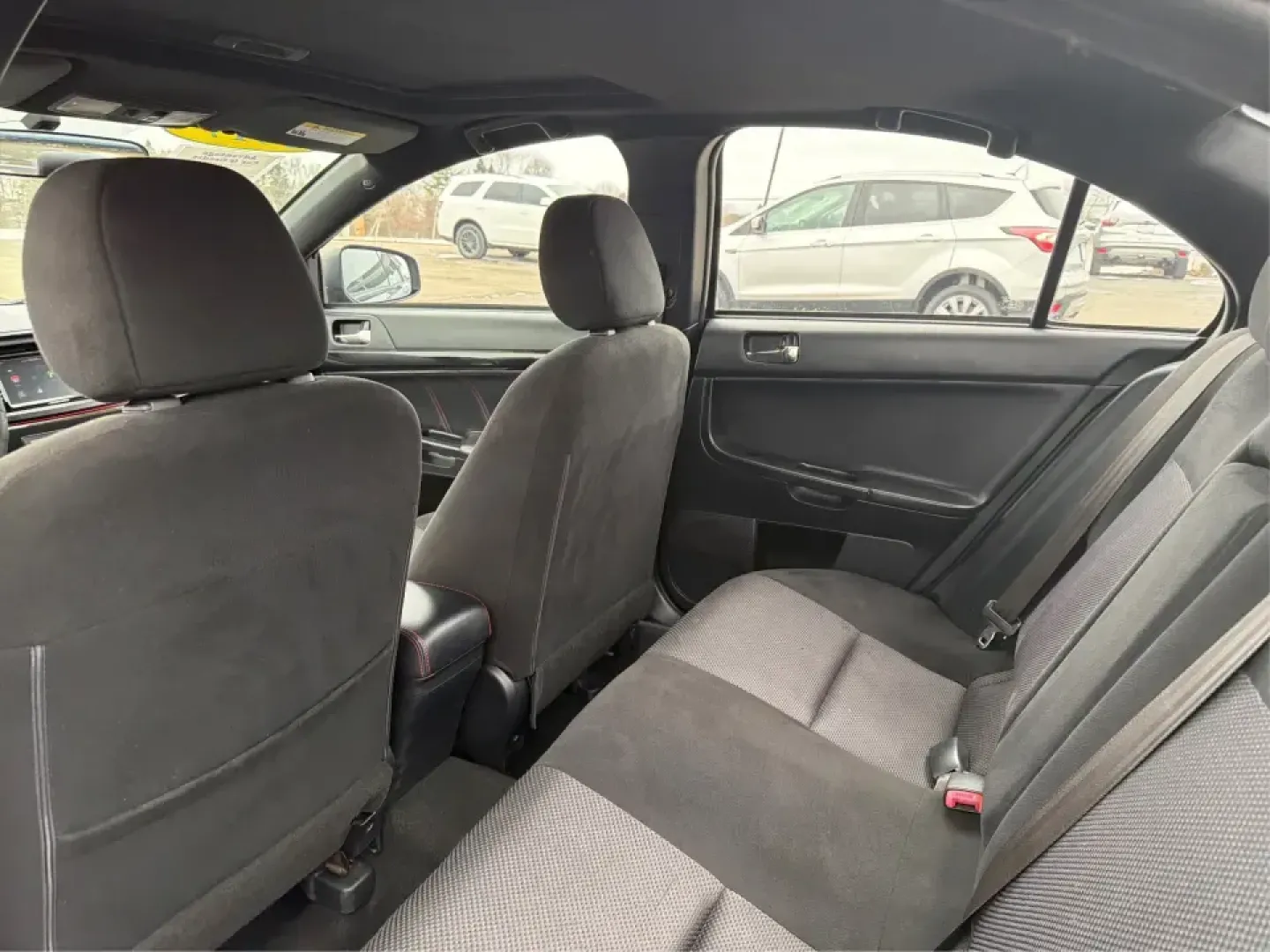 2017 Mitsubishi Lancer LE (JA32U2FU5HU) with an 2L I-4 DOHC engine, 5M transmission, located at 1184 Kauffman Ave, Fairborn, OH, 45324, (937) 908-9800, 39.807072, -84.030914 - Picture your week running smoothly: a dependable commuter sedan for the drive to Dayton, an easy-to-park ride for errands around Xenia Station, and a comfortable car that's ready for a spontaneous weekend trip to Glen Helen Nature Preserve. This 2017 Mitsubishi Lancer LE is built for real-life routi - Photo#10