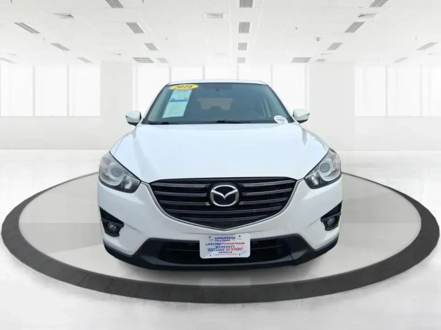 2016 Mazda CX-5 Touring (JM3KE4CY4G0) with an SKYACTIV-G 2.5L I-4 gasoline direct injection engine, 6-Speed Automatic transmission, located at 401 Woodman Dr, Riverside, OH, 45431, (937) 908-9800, 39.760899, -84.123421 - Weekend getaways to John Bryan State Park, everyday commuting down Woodman Dr, or hauling groceries back from The Greene-this 2016 Mazda CX-5 Touring is the kind of SUV that fits real life in Riverside, Ohio. With confident all-weather capability and a smart, comfortable cabin, it's a practical choi - Photo#7