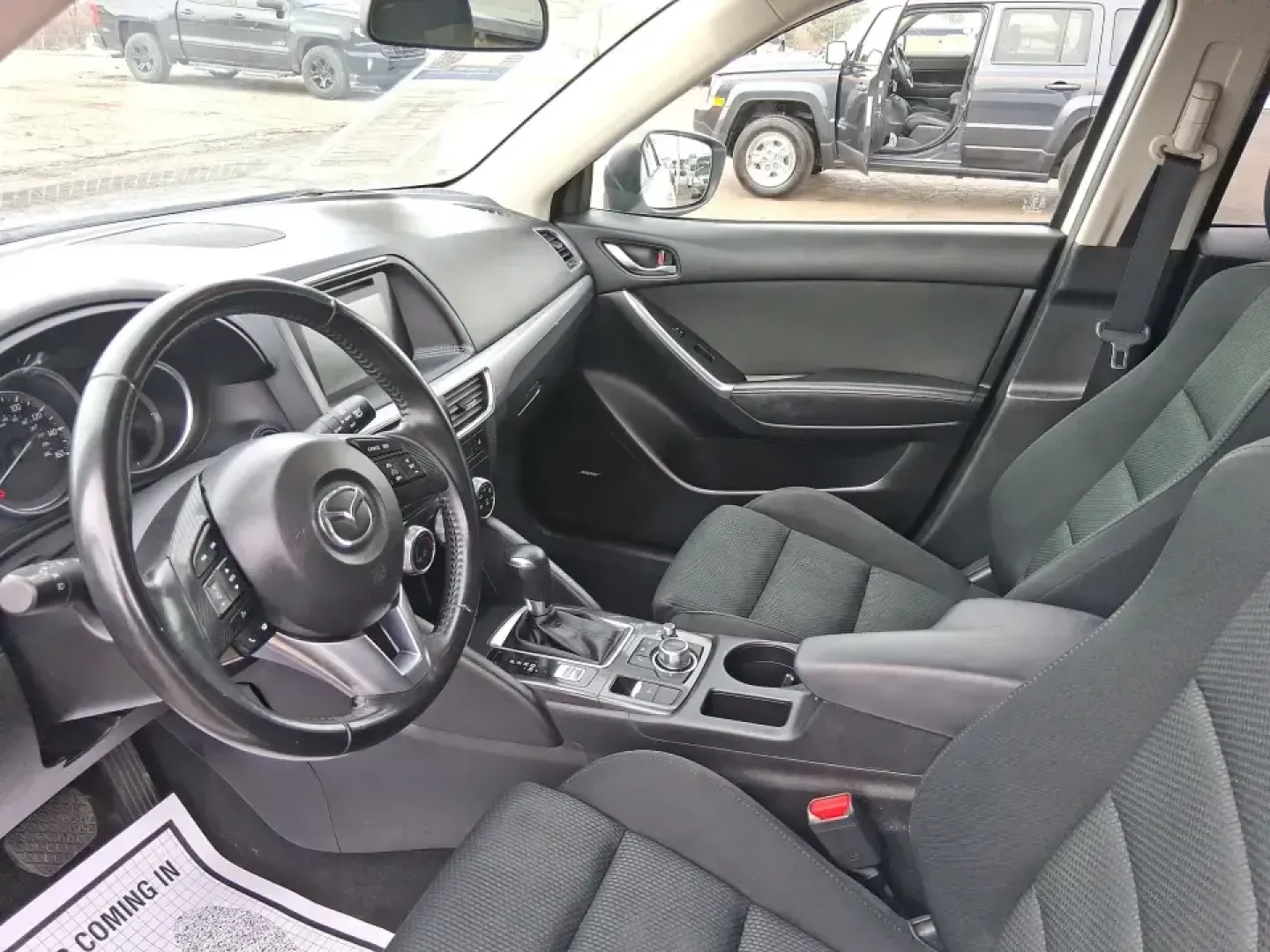 2016 Mazda CX-5 Touring (JM3KE4CY4G0) with an SKYACTIV-G 2.5L I-4 gasoline direct injection engine, 6-Speed Automatic transmission, located at 401 Woodman Dr, Riverside, OH, 45431, (937) 908-9800, 39.760899, -84.123421 - Weekend getaways to John Bryan State Park, everyday commuting down Woodman Dr, or hauling groceries back from The Greene-this 2016 Mazda CX-5 Touring is the kind of SUV that fits real life in Riverside, Ohio. With confident all-weather capability and a smart, comfortable cabin, it's a practical choi - Photo#9