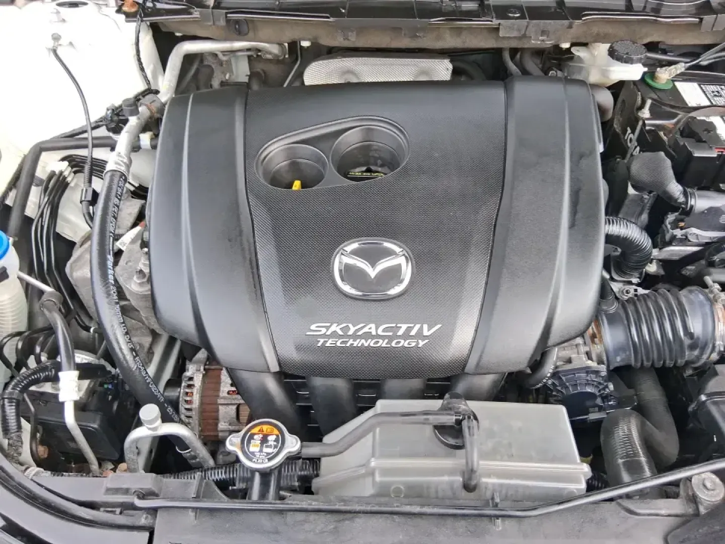 2016 Mazda CX-5 Touring (JM3KE4CY4G0) with an SKYACTIV-G 2.5L I-4 gasoline direct injection engine, 6-Speed Automatic transmission, located at 401 Woodman Dr, Riverside, OH, 45431, (937) 908-9800, 39.760899, -84.123421 - Weekend getaways to John Bryan State Park, everyday commuting down Woodman Dr, or hauling groceries back from The Greene-this 2016 Mazda CX-5 Touring is the kind of SUV that fits real life in Riverside, Ohio. With confident all-weather capability and a smart, comfortable cabin, it's a practical choi - Photo#11