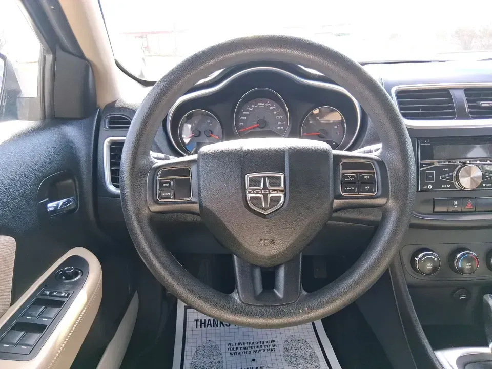 2014 Dodge Avenger SE (1C3CDZAB7EN) with an 2.4L L4 DOHC 16V engine, 4-Speed Automatic transmission, located at 4508 South Dixie Dr, Moraine, OH, 45439, (937) 908-9800, 39.689976, -84.218452 - Need a dependable sedan for the daily commute down I-75, quick school drop-offs, or weekend errands around Dayton-without the stress of traditional bank financing? This 2014 Dodge Avenger SE is a practical, comfortable choice for budget-conscious buyers who want a straightforward ride with the right - Photo#16