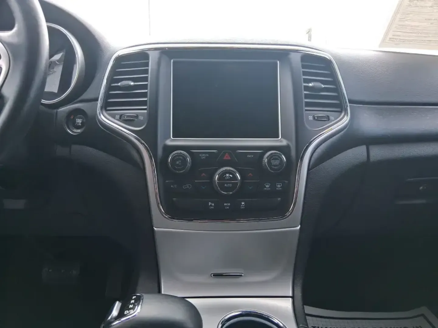 2015 Jeep Grand Cherokee Altitude (1C4RJFAG9FC) with an 3.6L V-6 DOHC engine, 8-Speed Automatic transmission, located at 1099 N County Rd 25A, Troy, OH, 45373, (937) 908-9800, 40.057079, -84.212883 - Weekend getaways to Hocking Hills, snowy school runs, or a confident daily commute up I75 feel easier when your SUV is built for real Ohio weather and real-life schedules. This 2015 Jeep Grand Cherokee Altitude in Bright White Clearcoat is the kind of capable, comfortable SUV that fits busy families - Photo#13