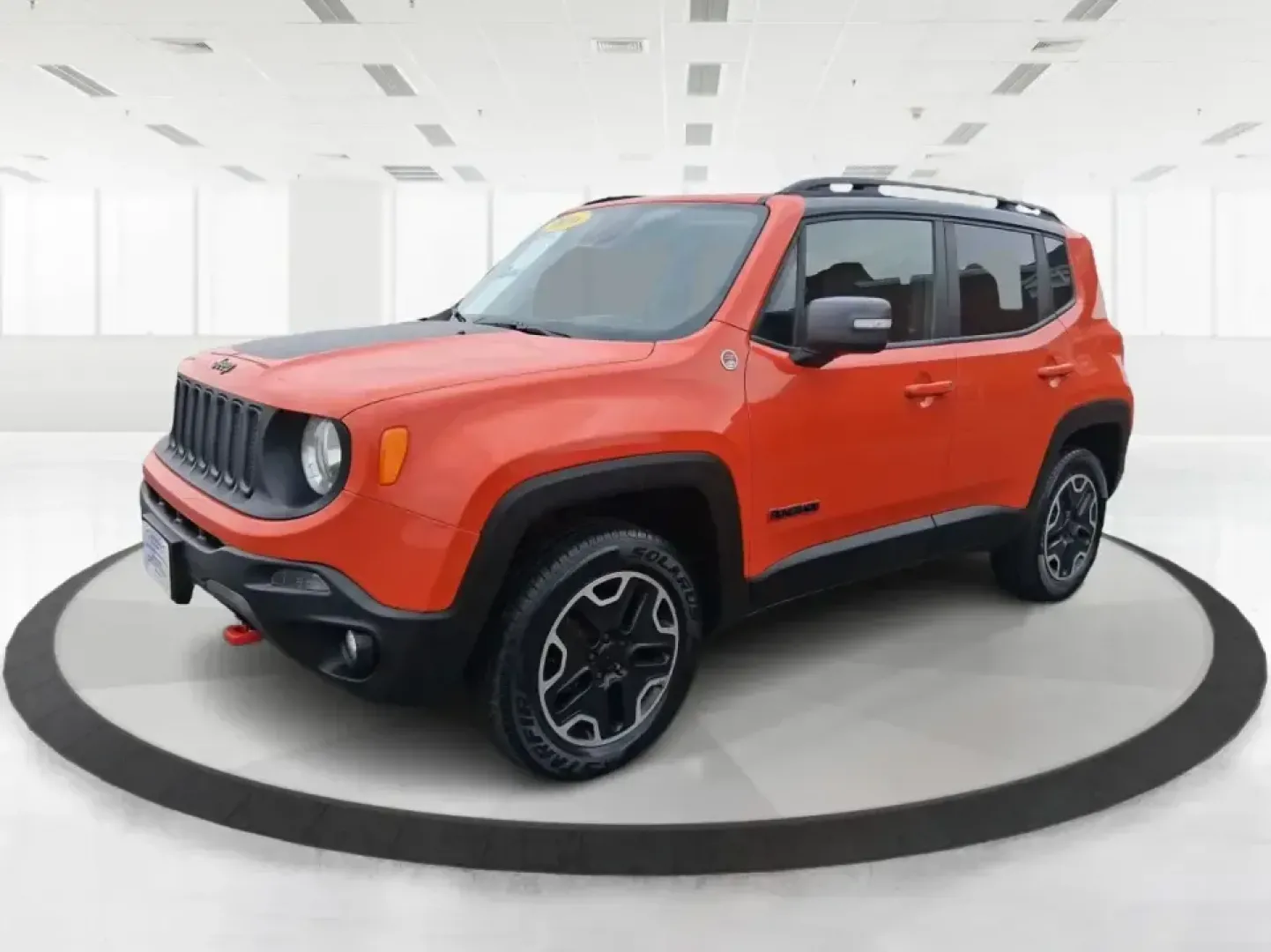 2016 Jeep Renegade Trailhawk (ZACCJBCT5GP) with an Tigershark MultiAir 2.4L I-4 variable valve contro engine, 9A transmission, located at 401 Woodman Dr, Riverside, OH, 45431, (937) 908-9800, 39.760899, -84.123421 - Weekend escapes, snowy commutes, and everyday errands feel easier when your crossover is ready for whatever Ohio throws your way. This **2016 Jeep Renegade Trailhawk** in eye-catching **Omaha Orange** is built for drivers who want real capability in a city-friendly size-perfect for exploring MetroPa - Photo#8