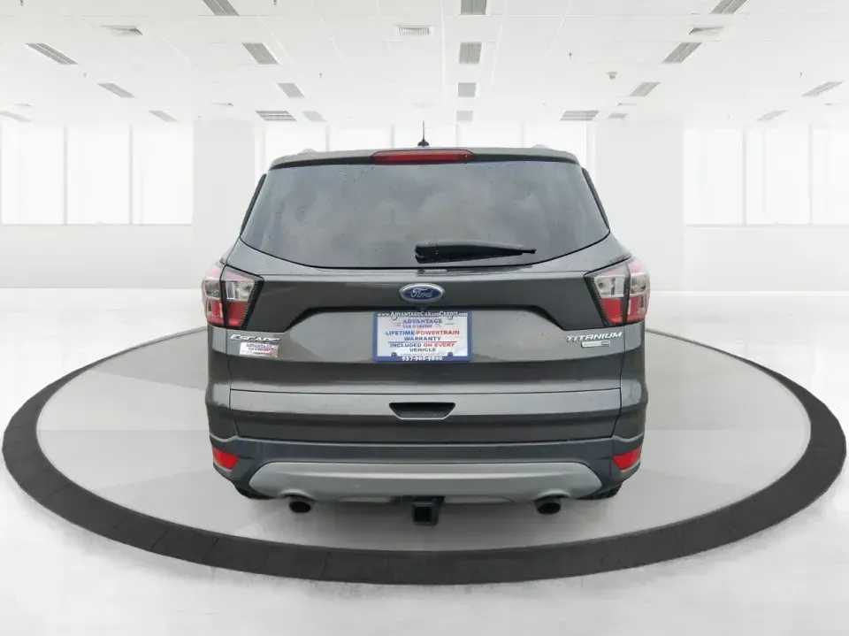 2017 Ford Escape Titanium (1FMCU9J94HU) with an 2.0L L4 DOHC 16V engine, 6A transmission, located at 8750 N County Rd 25A, Piqua, OH, 45356, (937) 908-9800, 40.164391, -84.232513 - Pack the gear, load up the family, and point the GPS toward your next weekend escape-this 2017 Ford Escape Titanium is the kind of compact SUV that fits real life in Piqua. Whether you're commuting up I75, running errands along N County Rd 25A, or planning a day trip to Lock 9 Park and the Great Mia - Photo#3