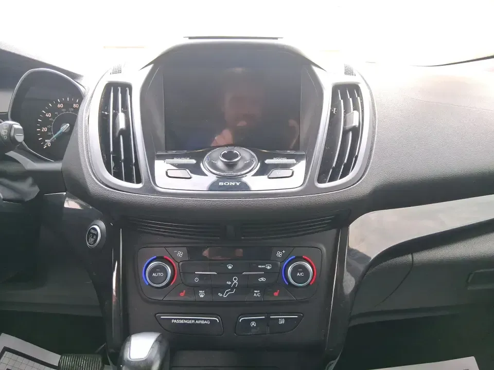 2017 Ford Escape Titanium (1FMCU9J94HU) with an 2.0L L4 DOHC 16V engine, 6A transmission, located at 8750 N County Rd 25A, Piqua, OH, 45356, (937) 908-9800, 40.164391, -84.232513 - Pack the gear, load up the family, and point the GPS toward your next weekend escape-this 2017 Ford Escape Titanium is the kind of compact SUV that fits real life in Piqua. Whether you're commuting up I75, running errands along N County Rd 25A, or planning a day trip to Lock 9 Park and the Great Mia - Photo#13