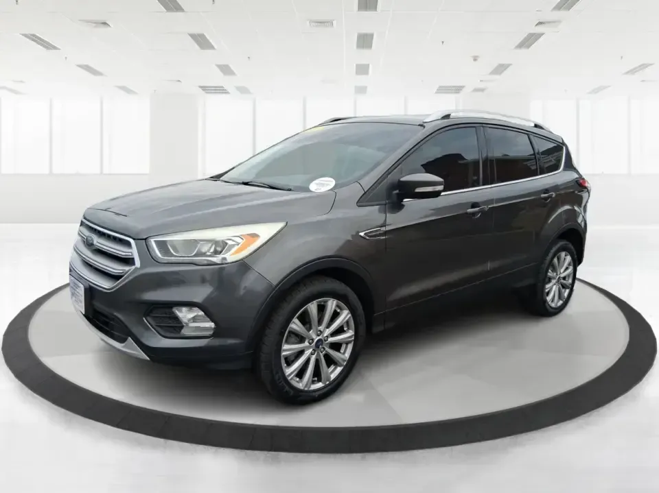 2017 Ford Escape Titanium (1FMCU9J94HU) with an 2.0L L4 DOHC 16V engine, 6A transmission, located at 1951 S Dayton Lakeview Rd., New Carlisle, OH, 45344, (937) 908-9800, 39.890999, -84.050255 - Pack the gear, load up the family, and point the GPS toward your next weekend escape-this 2017 Ford Escape Titanium is the kind of compact SUV that fits real life in Piqua. Whether you're commuting up I75, running errands along N County Rd 25A, or planning a day trip to Lock 9 Park and the Great Mia - Photo#8