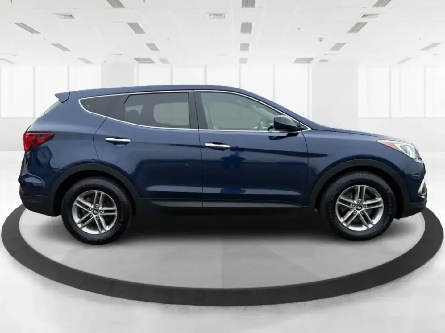 2018 Hyundai Santa Fe 2.4L (5XYZTDLB6JG) with an Theta II 2.4L I-4 gasoline direct injection engine, 6A transmission, located at 8750 N County Rd 25A, Piqua, OH, 45356, (937) 908-9800, 40.164391, -84.232513 - Road trips to Indian Lake, snowy school runs, and everyday commuting up and down I75 feel a lot easier when your SUV is roomy, confident in bad weather, and comfortable for everyone on board. This 2018 Hyundai Santa Fe 2.4L in striking Nightfall Blue is a practical, family-friendly sport utility tha - Photo#1