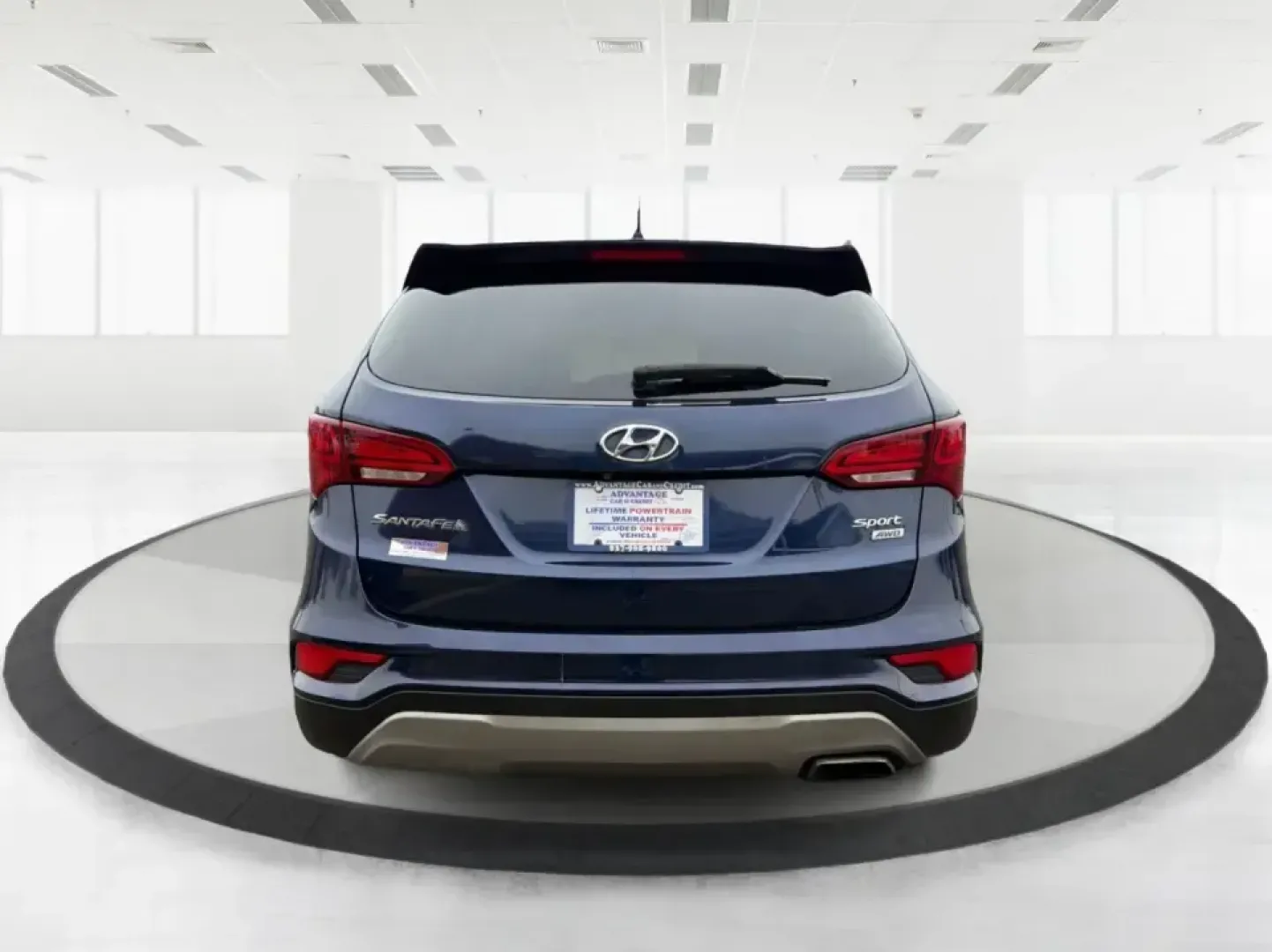 2018 Hyundai Santa Fe 2.4L (5XYZTDLB6JG) with an Theta II 2.4L I-4 gasoline direct injection engine, 6A transmission, located at 8750 N County Rd 25A, Piqua, OH, 45356, (937) 908-9800, 40.164391, -84.232513 - Road trips to Indian Lake, snowy school runs, and everyday commuting up and down I75 feel a lot easier when your SUV is roomy, confident in bad weather, and comfortable for everyone on board. This 2018 Hyundai Santa Fe 2.4L in striking Nightfall Blue is a practical, family-friendly sport utility tha - Photo#3