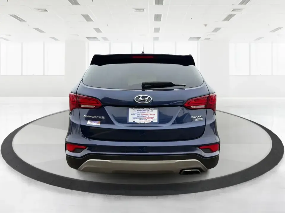 2018 Hyundai Santa Fe 2.4L (5XYZTDLB6JG) with an Theta II 2.4L I-4 gasoline direct injection engine, 6A transmission, located at 8750 N County Rd 25A, Piqua, OH, 45356, (937) 908-9800, 40.164391, -84.232513 - Road trips to Indian Lake, snowy school runs, and everyday commuting up and down I75 feel a lot easier when your SUV is roomy, confident in bad weather, and comfortable for everyone on board. This 2018 Hyundai Santa Fe 2.4L in striking Nightfall Blue is a practical, family-friendly sport utility tha - Photo#3