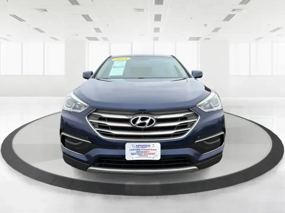 2018 Hyundai Santa Fe 2.4L (5XYZTDLB6JG) with an Theta II 2.4L I-4 gasoline direct injection engine, 6A transmission, located at 8750 N County Rd 25A, Piqua, OH, 45356, (937) 908-9800, 40.164391, -84.232513 - Road trips to Indian Lake, snowy school runs, and everyday commuting up and down I75 feel a lot easier when your SUV is roomy, confident in bad weather, and comfortable for everyone on board. This 2018 Hyundai Santa Fe 2.4L in striking Nightfall Blue is a practical, family-friendly sport utility tha - Photo#7