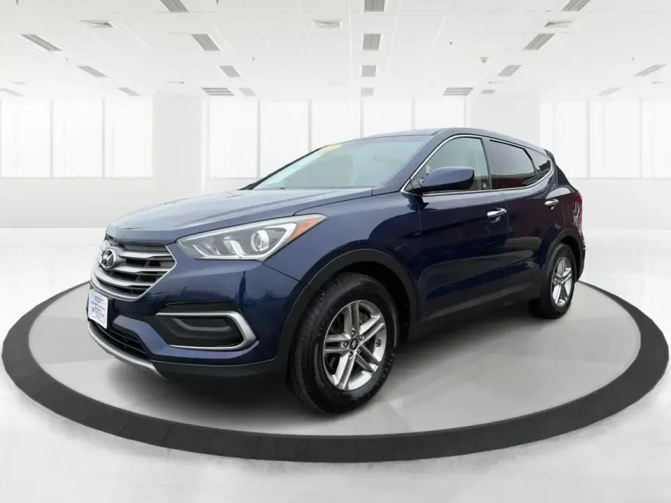 2018 Hyundai Santa Fe 2.4L (5XYZTDLB6JG) with an Theta II 2.4L I-4 gasoline direct injection engine, 6A transmission, located at 8750 N County Rd 25A, Piqua, OH, 45356, (937) 908-9800, 40.164391, -84.232513 - Road trips to Indian Lake, snowy school runs, and everyday commuting up and down I75 feel a lot easier when your SUV is roomy, confident in bad weather, and comfortable for everyone on board. This 2018 Hyundai Santa Fe 2.4L in striking Nightfall Blue is a practical, family-friendly sport utility tha - Photo#8