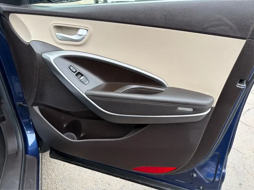 2018 Hyundai Santa Fe 2.4L (5XYZTDLB6JG) with an Theta II 2.4L I-4 gasoline direct injection engine, 6A transmission, located at 8750 N County Rd 25A, Piqua, OH, 45356, (937) 908-9800, 40.164391, -84.232513 - Road trips to Indian Lake, snowy school runs, and everyday commuting up and down I75 feel a lot easier when your SUV is roomy, confident in bad weather, and comfortable for everyone on board. This 2018 Hyundai Santa Fe 2.4L in striking Nightfall Blue is a practical, family-friendly sport utility tha - Photo#20