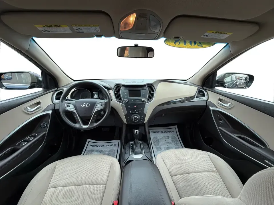 2018 Hyundai Santa Fe 2.4L (5XYZTDLB6JG) with an Theta II 2.4L I-4 gasoline direct injection engine, 6A transmission, located at 8750 N County Rd 25A, Piqua, OH, 45356, (937) 908-9800, 40.164391, -84.232513 - Road trips to Indian Lake, snowy school runs, and everyday commuting up and down I75 feel a lot easier when your SUV is roomy, confident in bad weather, and comfortable for everyone on board. This 2018 Hyundai Santa Fe 2.4L in striking Nightfall Blue is a practical, family-friendly sport utility tha - Photo#21