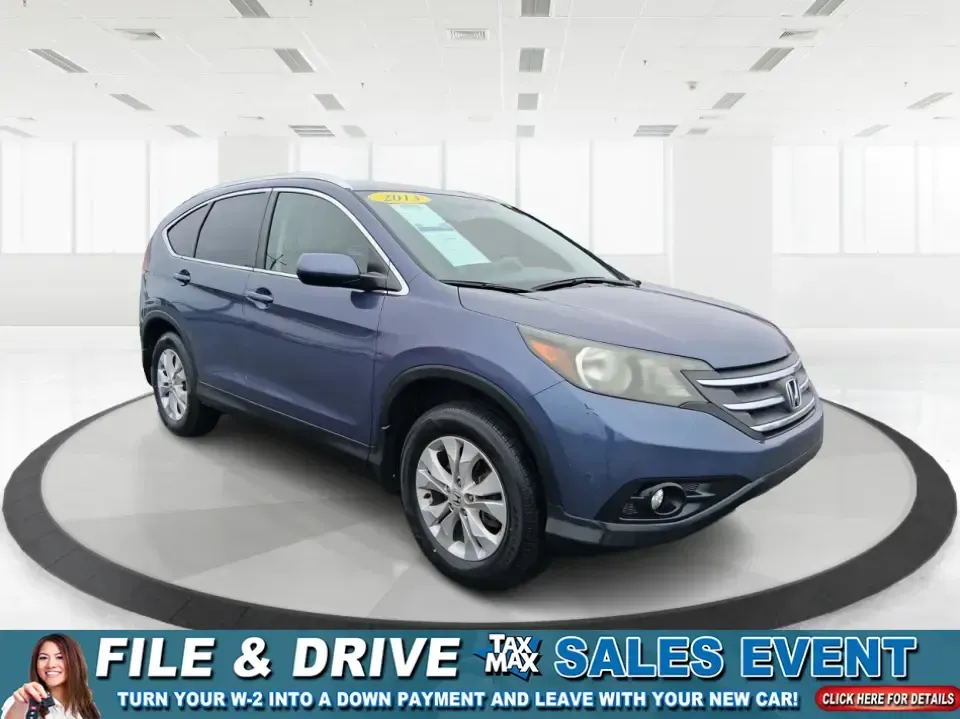2013 Honda CR-V EX-L (2HKRM4H74DH) with an 2.4L I-4 DOHC engine, 5-Speed Automatic transmission, located at 1099 N County Rd 25A, Troy, OH, 45373, (937) 908-9800, 40.057079, -84.212883 - Picture your next weekend: a quick run up I75 for a Dayton Dragons game, a family trip to Treasure Island Park, or a snowy school-morning commute across Troy-without stressing about space, comfort, or traction. This 2013 Honda CRV EXL in Twilight Blue Metallic is the kind of do-it-all SUV that fits - Photo#0