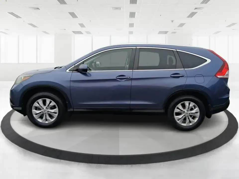 2013 Honda CR-V EX-L (2HKRM4H74DH) with an 2.4L I-4 DOHC engine, 5-Speed Automatic transmission, located at 1099 N County Rd 25A, Troy, OH, 45373, (937) 908-9800, 40.057079, -84.212883 - Picture your next weekend: a quick run up I75 for a Dayton Dragons game, a family trip to Treasure Island Park, or a snowy school-morning commute across Troy-without stressing about space, comfort, or traction. This 2013 Honda CRV EXL in Twilight Blue Metallic is the kind of do-it-all SUV that fits - Photo#5