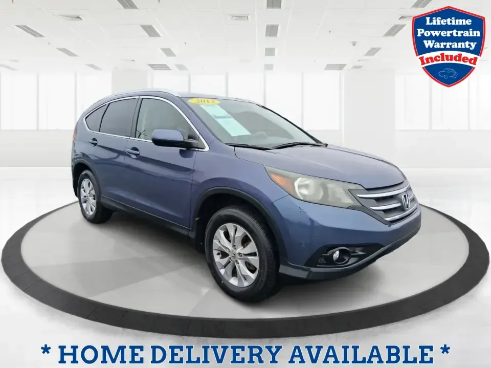 2013 Honda CR-V EX-L (2HKRM4H74DH) with an 2.4L I-4 DOHC engine, 5-Speed Automatic transmission, located at 1099 N County Rd 25A, Troy, OH, 45373, (937) 908-9800, 40.057079, -84.212883 - Picture your next weekend: a quick run up I75 for a Dayton Dragons game, a family trip to Treasure Island Park, or a snowy school-morning commute across Troy-without stressing about space, comfort, or traction. This 2013 Honda CRV EXL in Twilight Blue Metallic is the kind of do-it-all SUV that fits - Photo#0