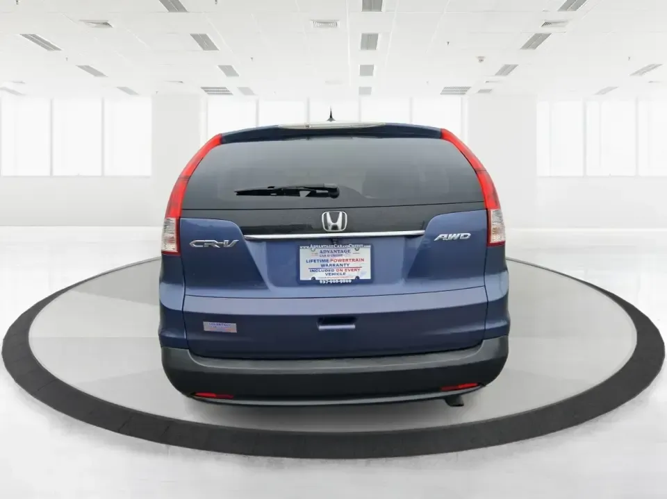 2013 Honda CR-V EX-L (2HKRM4H74DH) with an 2.4L I-4 DOHC engine, 5-Speed Automatic transmission, located at 1184 Kauffman Ave, Fairborn, OH, 45324, (937) 908-9800, 39.807072, -84.030914 - Picture your next weekend: a quick run up I75 for a Dayton Dragons game, a family trip to Treasure Island Park, or a snowy school-morning commute across Troy-without stressing about space, comfort, or traction. This 2013 Honda CRV EXL in Twilight Blue Metallic is the kind of do-it-all SUV that fits - Photo#3