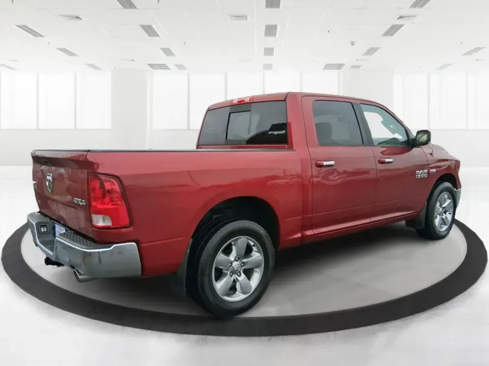 2013 Ram 1500 Big Horn (1C6RR7LT6DS) with an HEMI 5.7L V-8 variable valve control engine, 6-Speed Automatic transmission, located at 880 E. National Road, Vandalia, OH, 45377, (937) 908-9800, 39.891918, -84.183594 - Need a truck that can handle weekday work runs and still feel ready for a spontaneous weekend escape? This Flame Red Clearcoat 2013 Ram 1500 Big Horn Crew Cab is built for real-life Ohio driving-hauling, towing, commuting, and road-tripping with the comfort your passengers will appreciate and the ca - Photo#2