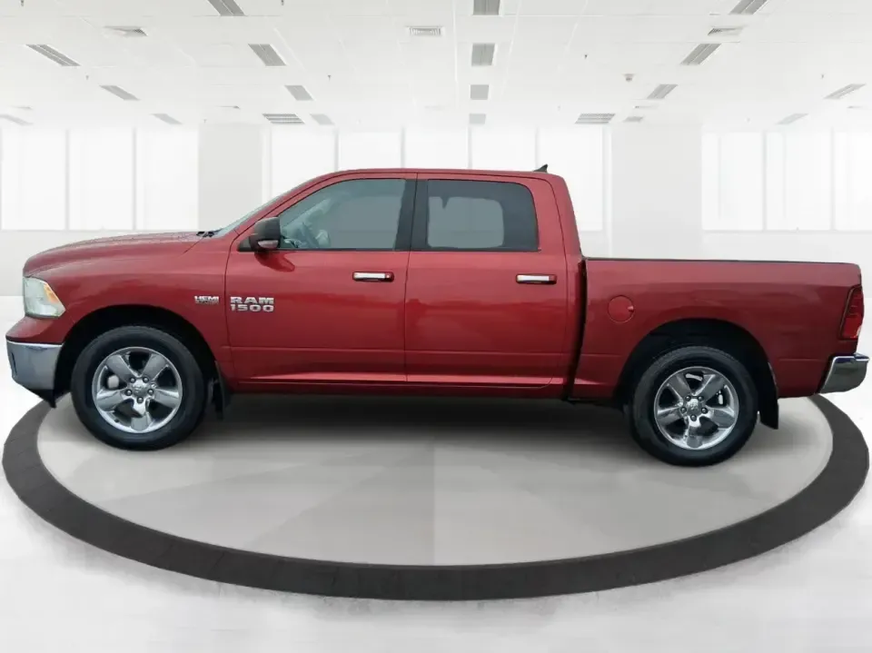 2013 Ram 1500 Big Horn (1C6RR7LT6DS) with an HEMI 5.7L V-8 variable valve control engine, 6-Speed Automatic transmission, located at 880 E. National Road, Vandalia, OH, 45377, (937) 908-9800, 39.891918, -84.183594 - Need a truck that can handle weekday work runs and still feel ready for a spontaneous weekend escape? This Flame Red Clearcoat 2013 Ram 1500 Big Horn Crew Cab is built for real-life Ohio driving-hauling, towing, commuting, and road-tripping with the comfort your passengers will appreciate and the ca - Photo#5