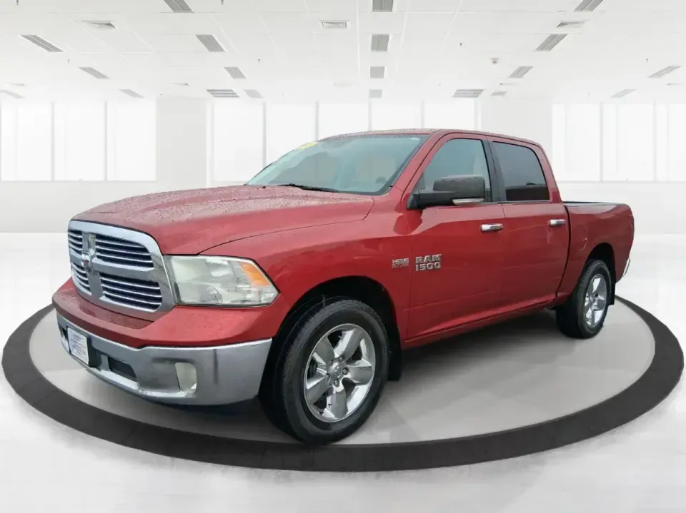 2013 Ram 1500 Big Horn (1C6RR7LT6DS) with an HEMI 5.7L V-8 variable valve control engine, 6-Speed Automatic transmission, located at 880 E. National Road, Vandalia, OH, 45377, (937) 908-9800, 39.891918, -84.183594 - Need a truck that can handle weekday work runs and still feel ready for a spontaneous weekend escape? This Flame Red Clearcoat 2013 Ram 1500 Big Horn Crew Cab is built for real-life Ohio driving-hauling, towing, commuting, and road-tripping with the comfort your passengers will appreciate and the ca - Photo#8