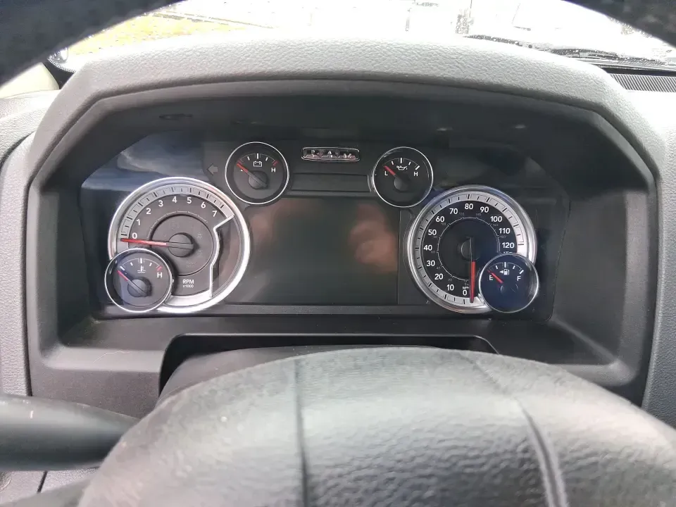 2013 Ram 1500 Big Horn (1C6RR7LT6DS) with an HEMI 5.7L V-8 variable valve control engine, 6-Speed Automatic transmission, located at 880 E. National Road, Vandalia, OH, 45377, (937) 908-9800, 39.891918, -84.183594 - Need a truck that can handle weekday work runs and still feel ready for a spontaneous weekend escape? This Flame Red Clearcoat 2013 Ram 1500 Big Horn Crew Cab is built for real-life Ohio driving-hauling, towing, commuting, and road-tripping with the comfort your passengers will appreciate and the ca - Photo#14