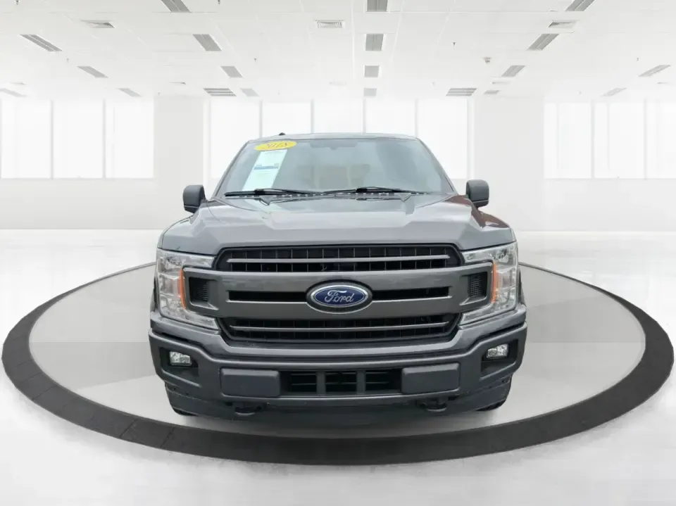 2018 Ford F-150 XLT (1FTEW1EG0JF) with an 3.5L V6 TURBO engine, 6A transmission, located at 880 E. National Road, Vandalia, OH, 45377, (937) 908-9800, 39.891918, -84.183594 - Built for Ohio workweeks and weekend getaways, this 2018 Ford F-150 XLT Crew Cab is the kind of truck that fits real life-hauling home-improvement supplies, towing the toys for a day at the lake, or cruising I-75 with the whole crew in comfort. Finished in Stone Gray and powered by a responsive 3.5L - Photo#7
