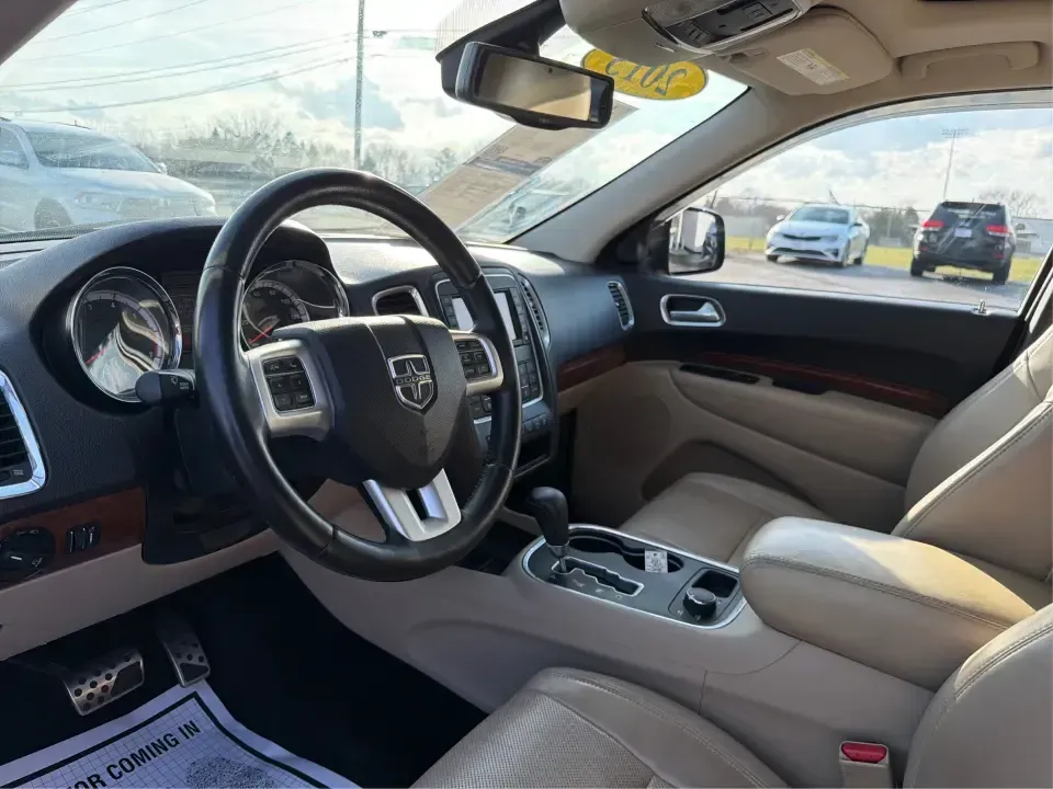 2013 Dodge Durango Citadel (1C4SDJET6DC) with an 5.7L V8 OHV 16V engine, 5-Speed Automatic transmission, located at 1951 S Dayton Lakeview Rd., New Carlisle, OH, 45344, (937) 908-9800, 39.890999, -84.050255 - Need one SUV that can handle school drop-offs, I-75 commutes, and a loaded-up weekend trip to Indian Lake or a tailgate in Dayton-without giving up comfort or capability? This 2013 Dodge Durango Citadel in True Blue Pearlcoat is built for real-life Ohio driving, with confident 4WD/AWD traction, V8 p - Photo#9