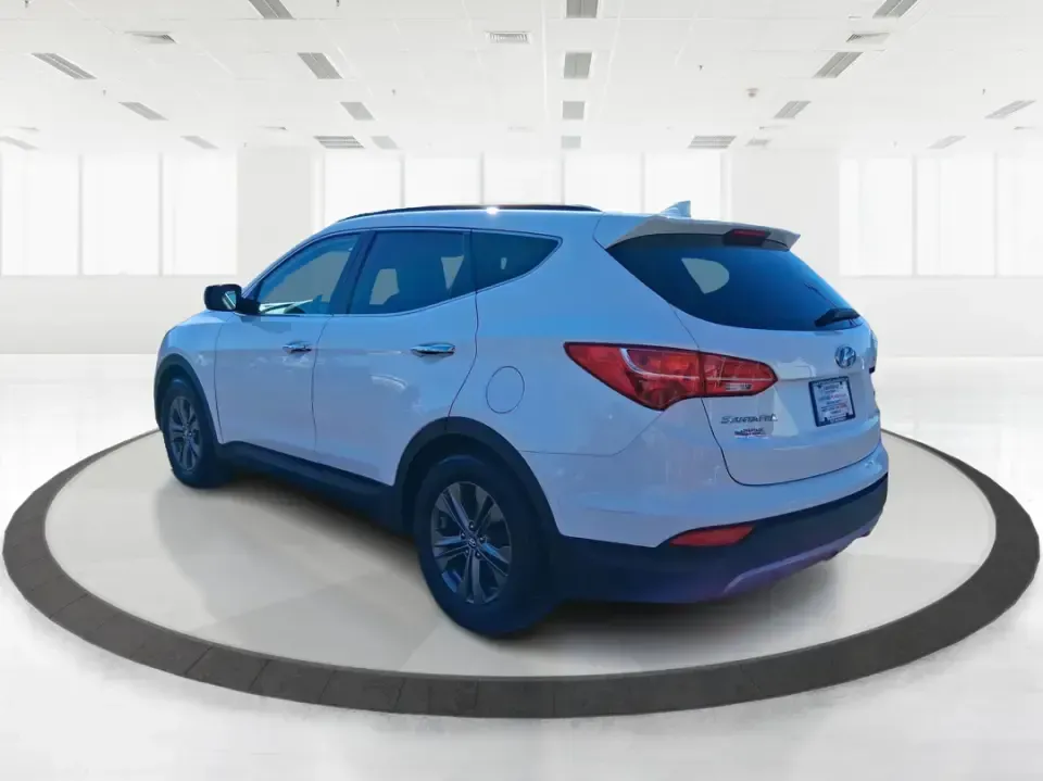 2013 Hyundai Santa Fe Sport (5XYZU3LB7DG) with an Theta II 2.4L I-4 gasoline direct injection engine, 6-Speed Automatic transmission, located at 880 E. National Road, Vandalia, OH, 45377, (937) 908-9800, 39.891918, -84.183594 - Need one SUV that can handle school drop-offs, I75 commutes, and a weekend escape to Taylorsville MetroPark without draining your budget? This 2013 Hyundai Santa Fe Sport is a smart, road-trip-ready crossover that blends everyday practicality with comfort features you'll appreciate on longer drives - Photo#4