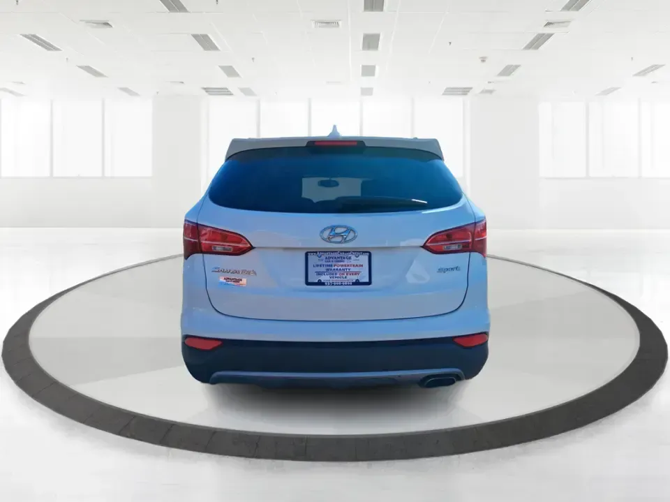 2013 Hyundai Santa Fe Sport (5XYZU3LB7DG) with an Theta II 2.4L I-4 gasoline direct injection engine, 6-Speed Automatic transmission, located at 1951 S Dayton Lakeview Rd., New Carlisle, OH, 45344, (937) 908-9800, 39.890999, -84.050255 - Need one SUV that can handle school drop-offs, I75 commutes, and a weekend escape to Taylorsville MetroPark without draining your budget? This 2013 Hyundai Santa Fe Sport is a smart, road-trip-ready crossover that blends everyday practicality with comfort features you'll appreciate on longer drives - Photo#3